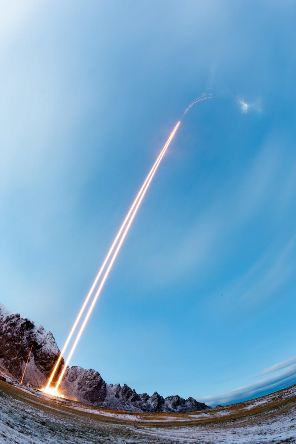 A time-lapse view of the two TRICE-2 Black Brant XII sounding rockets launching over the Norwegian Sea. <cite>Jamie Adkins/NASA</cite>